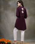 Purple cotton kurti with floral embroidery and lace-trimmed bell sleeves
