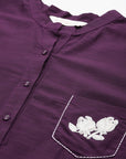 Purple cotton kurti with floral embroidery and lace-trimmed bell sleeves