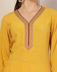 Solid Rayon Flared Kurta with Embroidered Detailing
