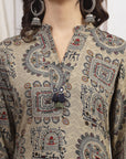 Green Viscose Rayon Kurti with Ethnic Motifs & Tassel Detail