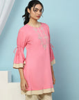 Solid Embroidered Knee Length Straight Tunic for Women