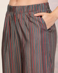 Ethnic Motif Flared Poly Viscose Kurta Set with Sequin Detail & Striped Palazzo