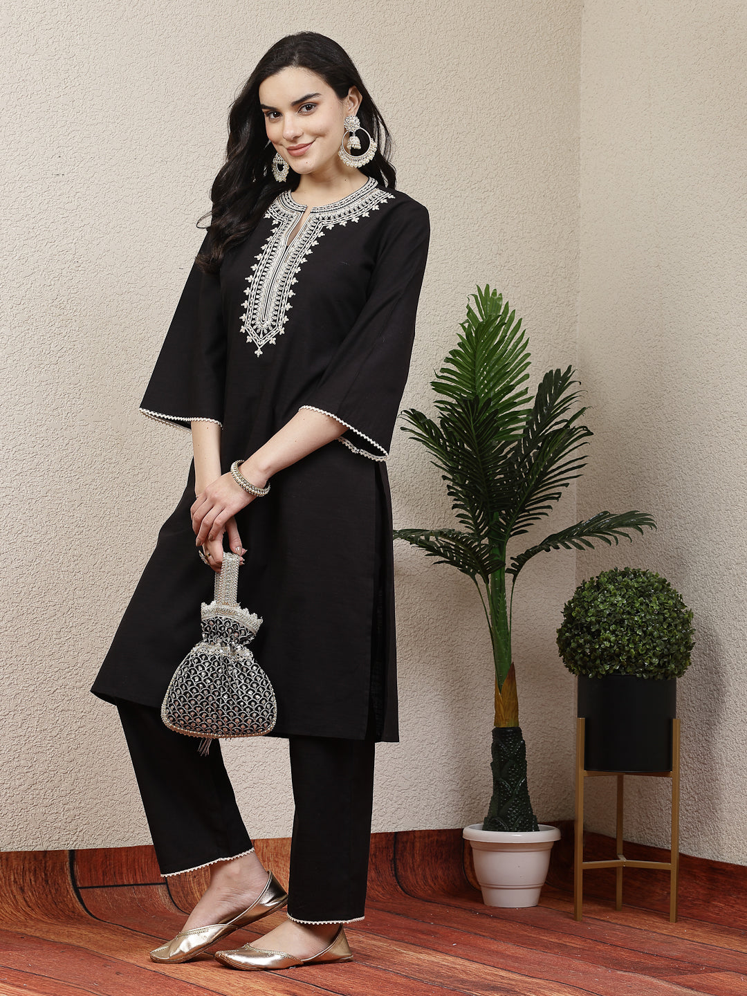 Embroidered black cotton linen kurta set with lace-detailed palazzo