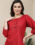 Women Solid Embroidered Tie Up Neck Top